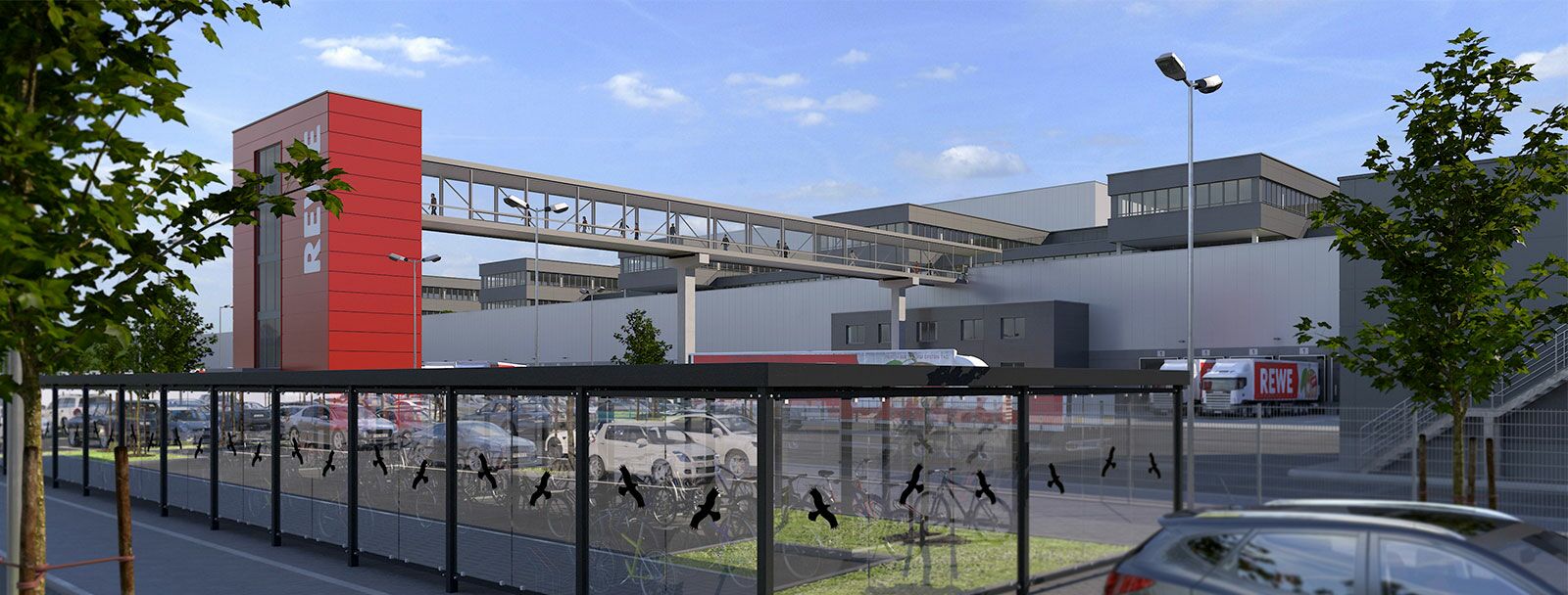 NOVIA: Projekt RED24 HUZ Zentralstandort Nord der REWE Group GmbH in Henstedt-Ulzburg (Außenansicht Logistikimmobilie mit REWE-Logo)
